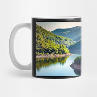 Lake between mountains Mug